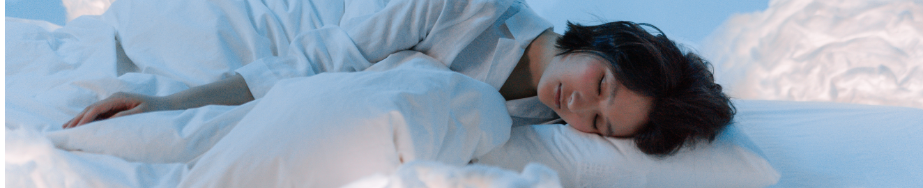 Woman sleeping on pillow